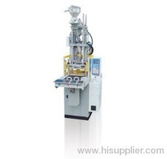 VERTICAL PLASTIC INJECTION MACHINES