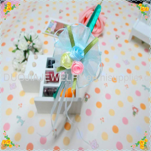 Cloth hairband with flower