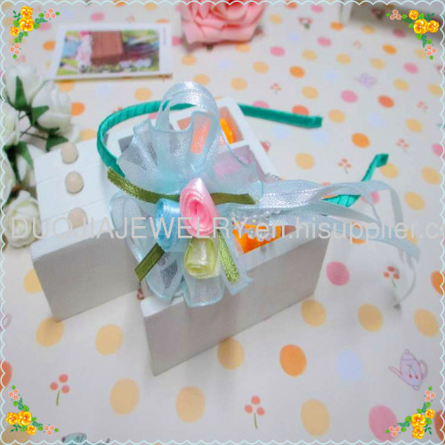 Cloth hairband with flower