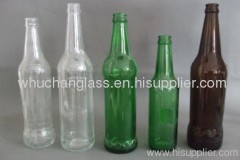 Clear,Amber and Green Beer Bottle
