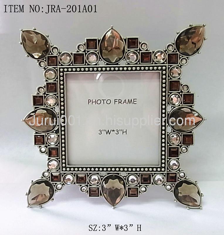 Metal photo frame with epoxy and crystals