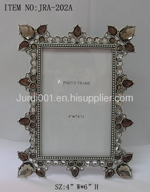 Metal photo frame with epoxy and crystals