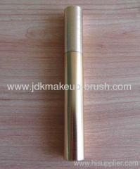 Golden cosmetic mascara tube