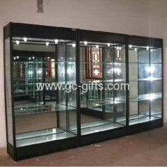 Against the wall glass display show cases