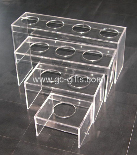 Clear acrylic display risers for retail use