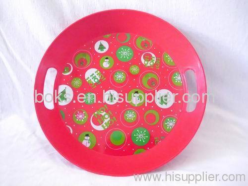 small red plastic Christmas plates