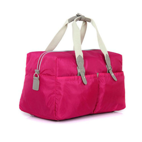 Red color travelling bags