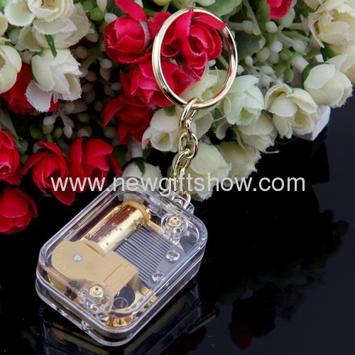 The new mini-gold-plated movement square keychain music box music box creative and practical