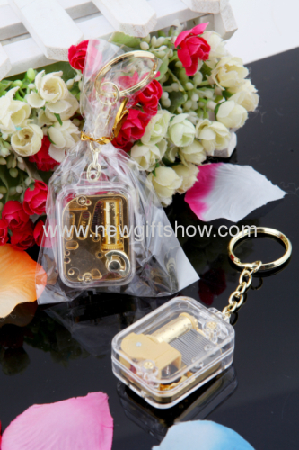 The new mini-gold-plated movement square keychain music box music box creative and practical