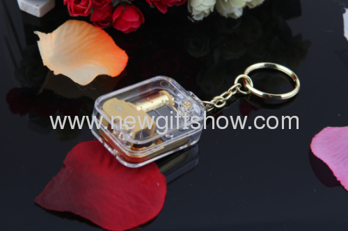 The new mini-gold-plated movement square keychain music box music box creative and practical