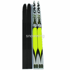 cross country skis and snowboard