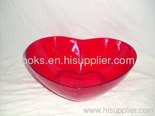 red plastic heart shaped bowls