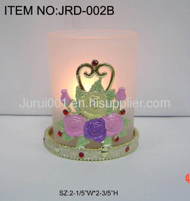 Metal candle holder with colorful flowers