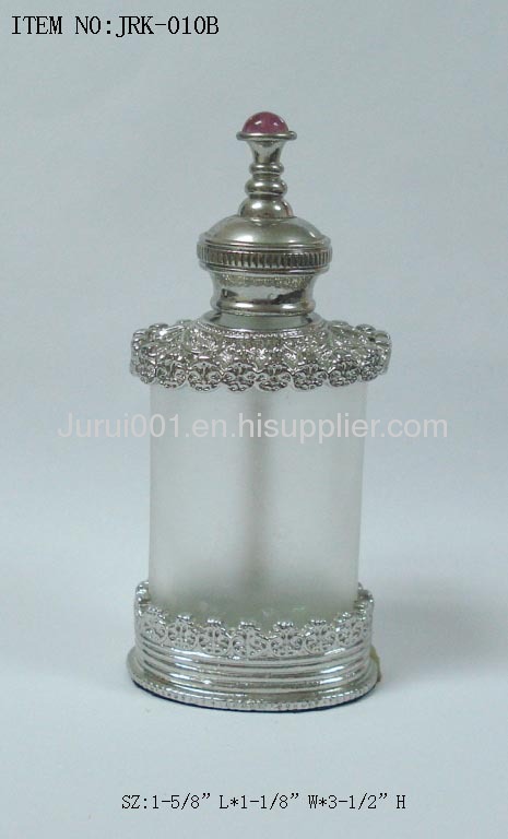 Metal perfume bottle with crystals