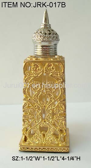 Metal perfume bottle with crystals