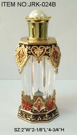 Metal perfume bottle with crystals