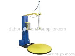 Top plate stretch wrapping machine