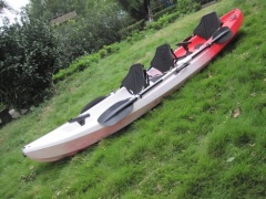three person sit on top kayak
