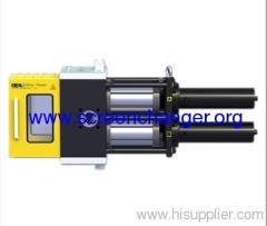 Double piston continuous screen changer for PET strap