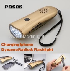 Crank dynamo powered FM radio torch for smart phone