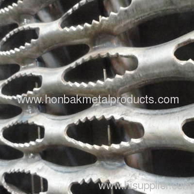 Perforated metal skid plate /safety tread