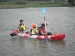 three person sit on top fishing kayak