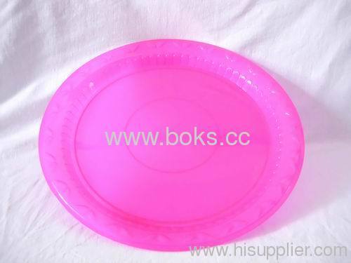 pink round plastic candy plates