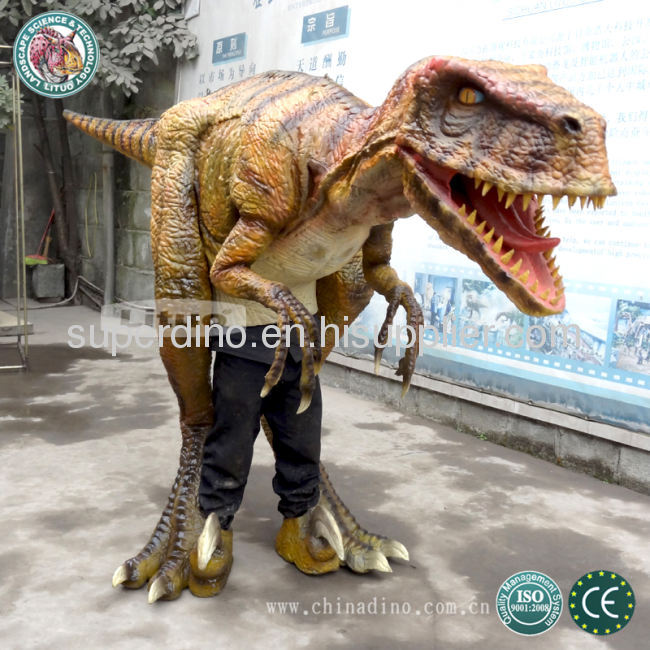adult walking with dinosuar costume 