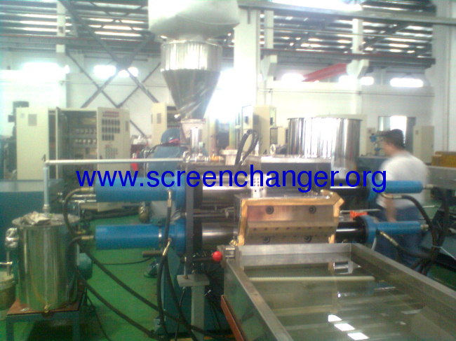 double piston continuous screen changer with backflush system