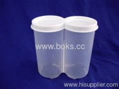 round plastic cookies and cracker tin boxes