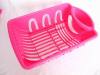 red plastic dish drainers