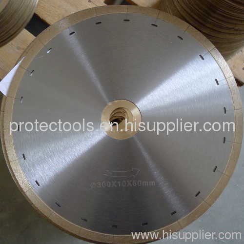 Hot pressed with narrow slot blades for ceramic tiles
