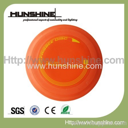 Orange rubber disc golf disc