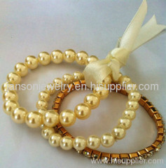 faux pearl rhinestone bangle set