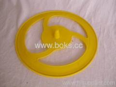 yellow plastic flying disk toys