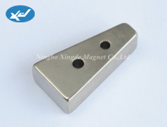 block shape with countersunk NdFeB magnets
