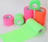 Nonwoven cohesive eastic bandage