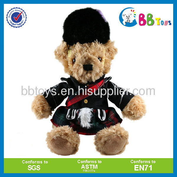 teddy bear plush toy in black cap