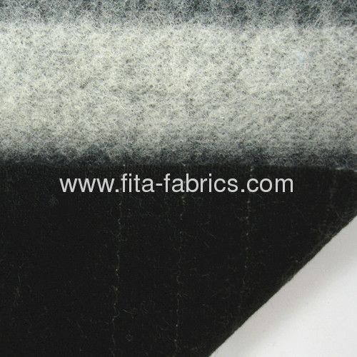 Knitted fleece fabric made of wool/polyester