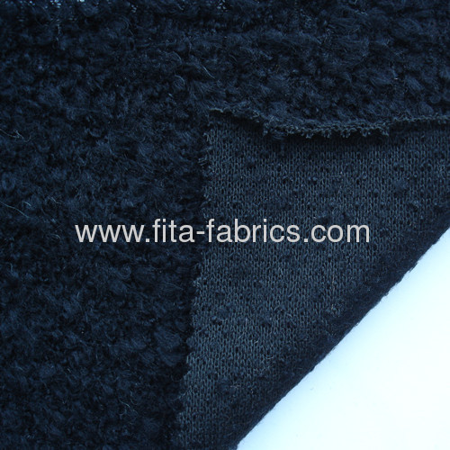 Knitted looped fabric blended of wool/acrylic/polyester