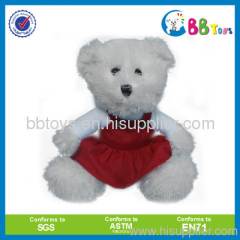 bear stuffed toy in red skirt