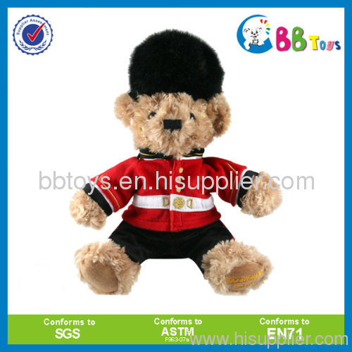 teddy bear plush toy in black cap