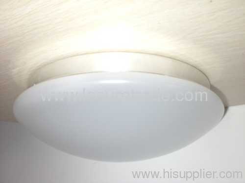 LED ceiling lighting fixture with a movement sensor