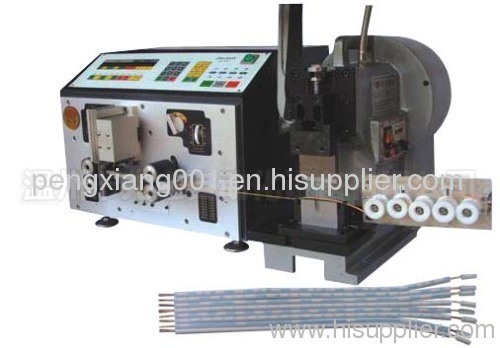 Wire cutting and stripping machine