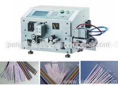 Wire cutting and stripping machine