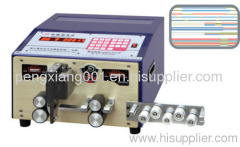 Wire cutting and stripping machine