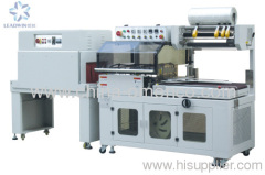 Automatic sealing and shrink packing machine