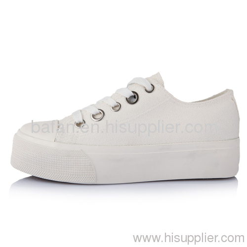 woman lie fallow plimsolls