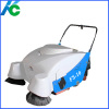 Walk behind floor sweeper