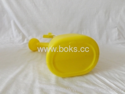 yellow plastic watering can